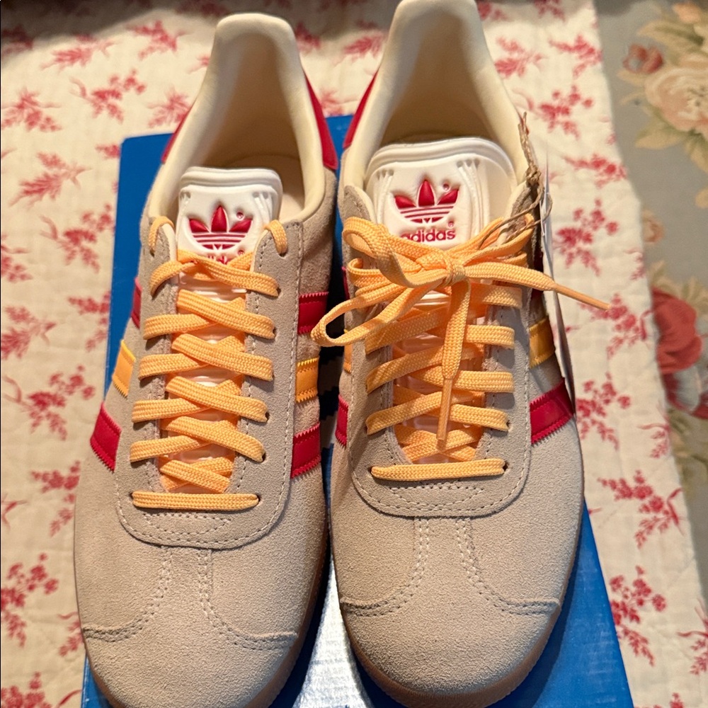 Adidas Beige Sneakers with Red and Yellow Accents